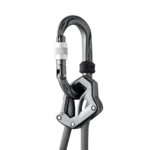 Close-up profile view focusing on the ergonomic matte black metal rope clamp of the Edelrid Pakhura Adjust. The tactical olive-drab dynamic rope threads smoothly through the curved channel of the clamp, emphasizing the hardware design engineered for adjusting lanyard length easily under load.